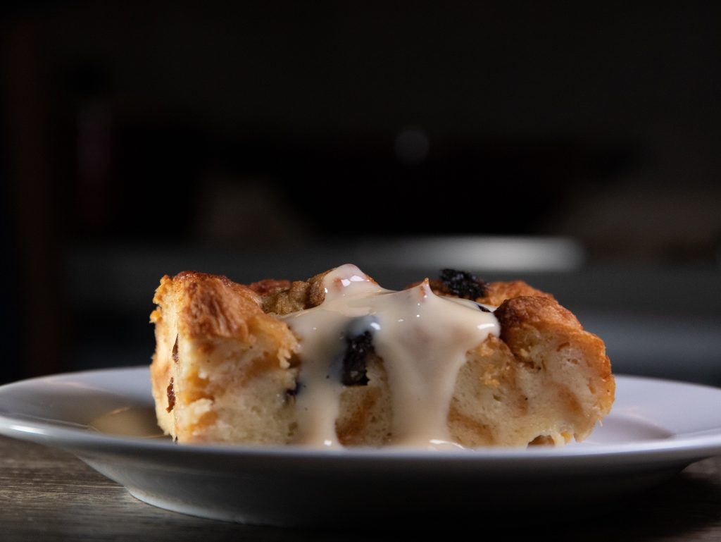 creme anglaise on bread and butter pudding